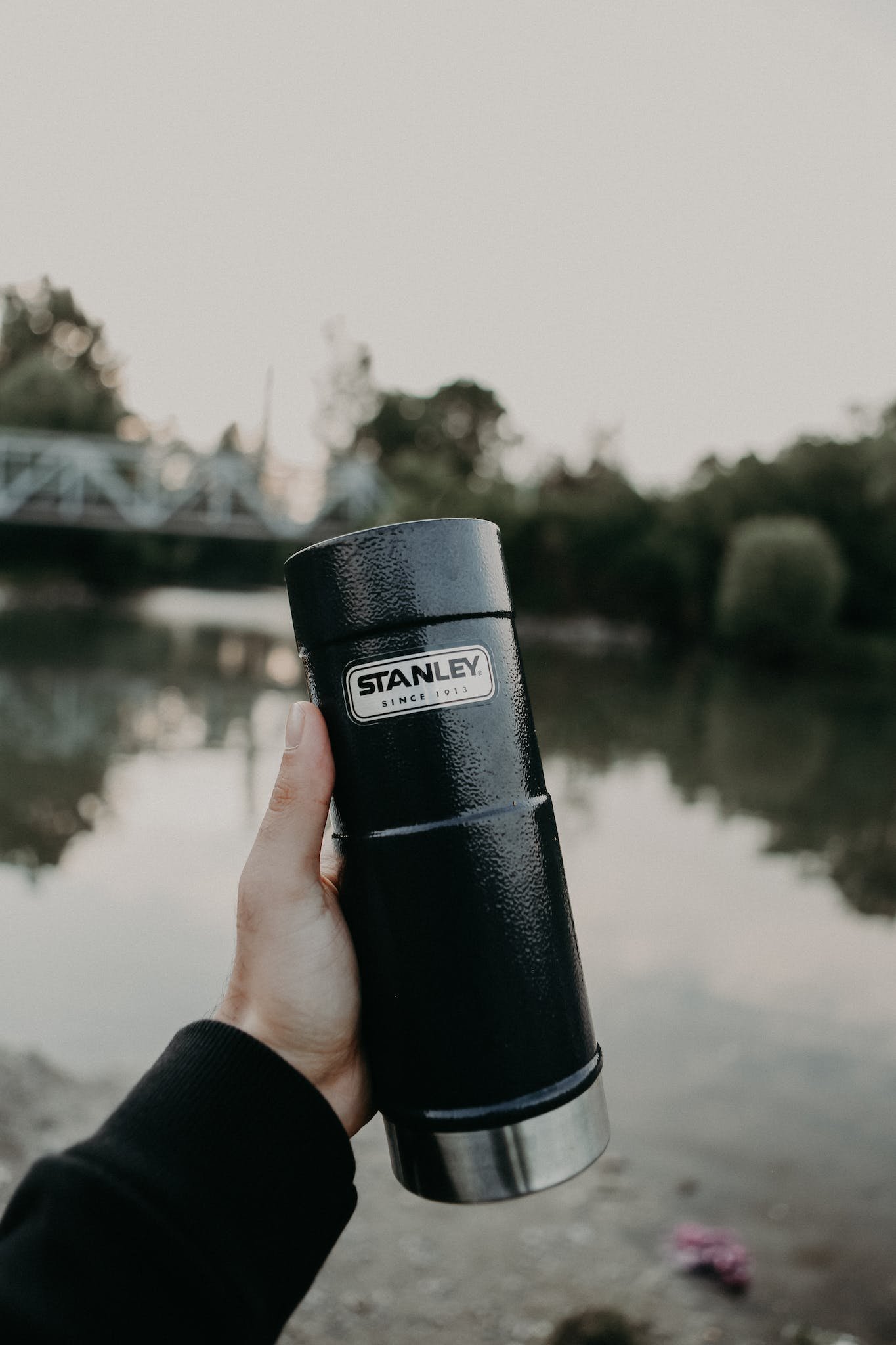 Hand Holding Vacuum Bottle