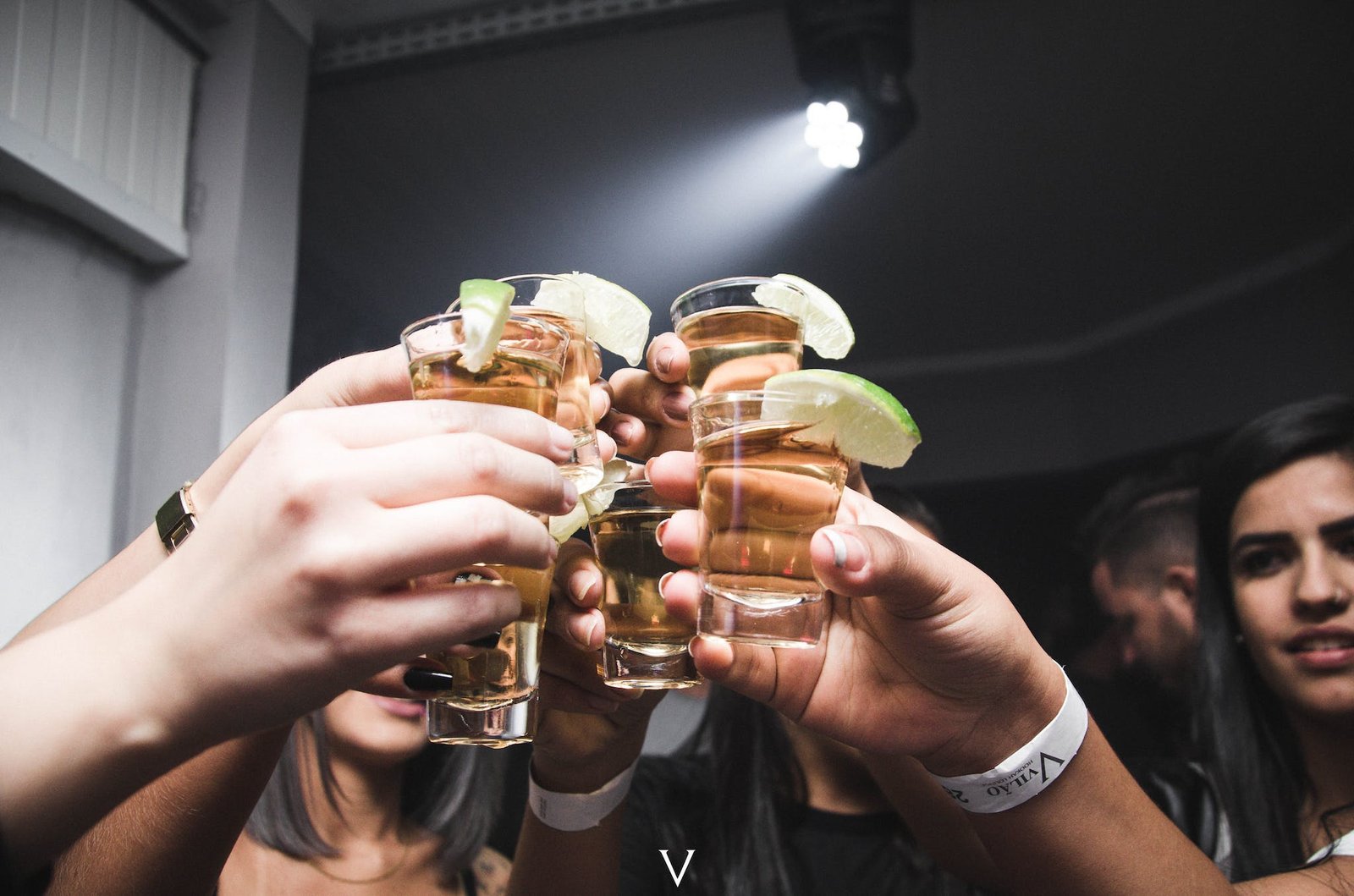 Photo of People Doing Cheers with alcoholic drinks