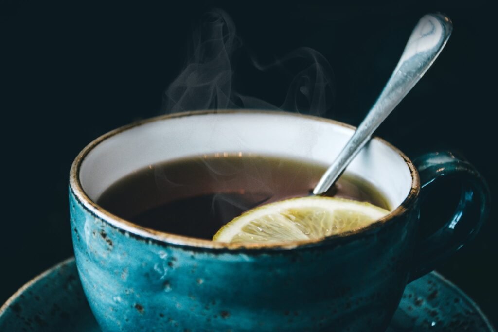 Photography of Blue Ceramic cup with tea
