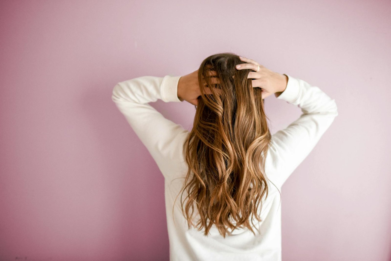 Woman Wearing White Long-sleeved Shirt how to hydrate hair