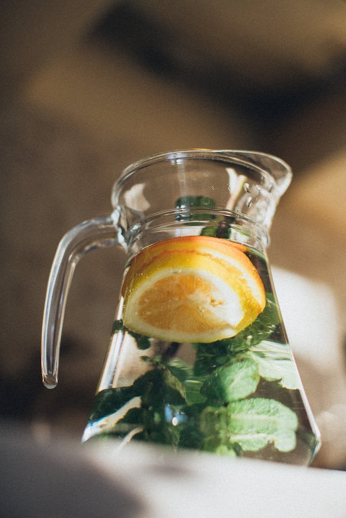 Water With Sliced Lemon in Pitcher