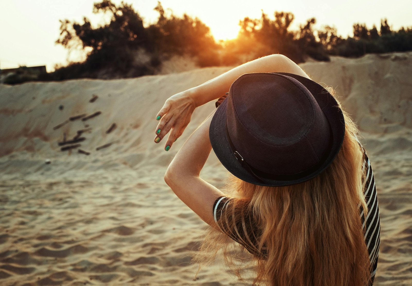 Woman Covering Face With Both Hands