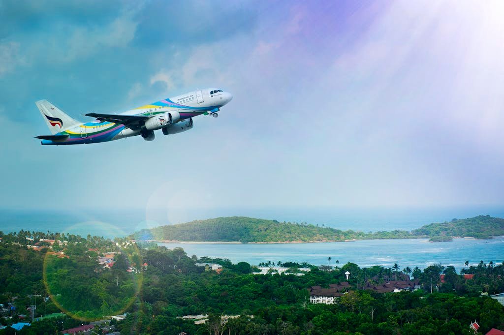 White and Blue Passenger Airplane Aerial Photography